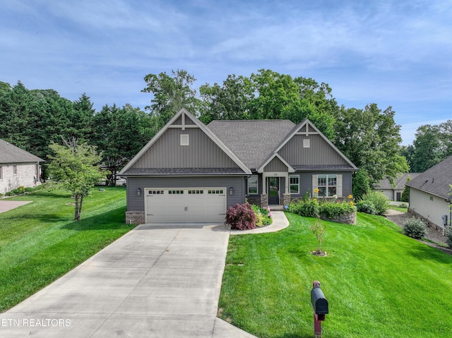 126 Pocola Way, Loudon, TN 37774 - craftsman house with board and batten siding, driveway, an attached garage, a front yard, and a shingled roof