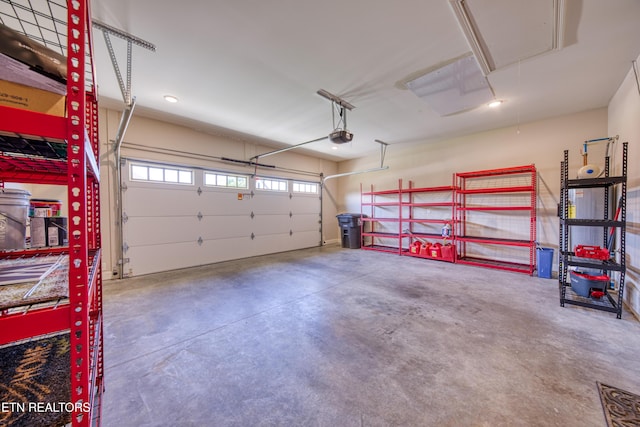 126 Pocola Way, Loudon, TN 37774 - garage with a garage door opener and recessed lighting