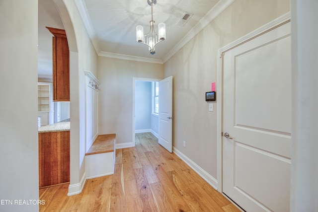 126 Pocola Way, Loudon, TN 37774 - mudroom with ornamental molding, light wood-type flooring, a chandelier, and arched walkways