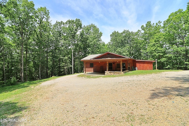 495 Bear Hollow Rd, Oneida, TN 37841 - view of front of house with driveway and a wooded view
