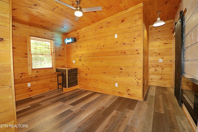 495 Bear Hollow Rd, Oneida, TN 37841 - unfurnished room featuring wood ceiling, dark wood-style flooring, wooden walls, and a ceiling fan