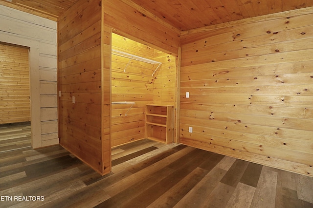 495 Bear Hollow Rd, Oneida, TN 37841 - unfurnished room featuring a relaxing sauna, wood walls, wooden ceiling, and dark wood finished floors