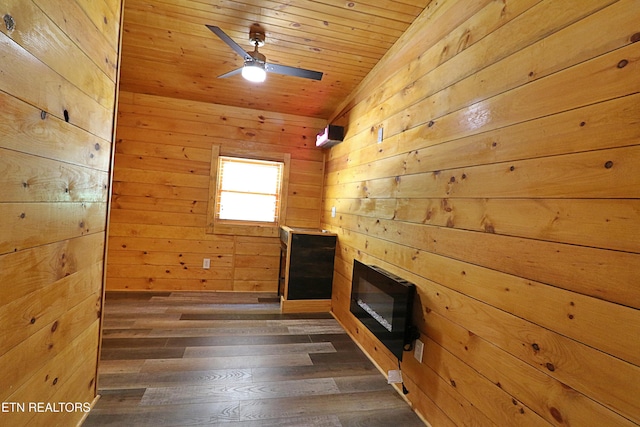 495 Bear Hollow Rd, Oneida, TN 37841 - unfurnished living room with wooden walls, wooden ceiling, dark wood-style floors, and ceiling fan