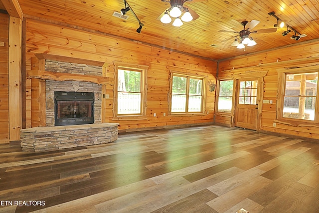495 Bear Hollow Rd, Oneida, TN 37841 - unfurnished living room featuring rail lighting, hardwood / wood-style flooring, a fireplace, ceiling fan, and wooden ceiling