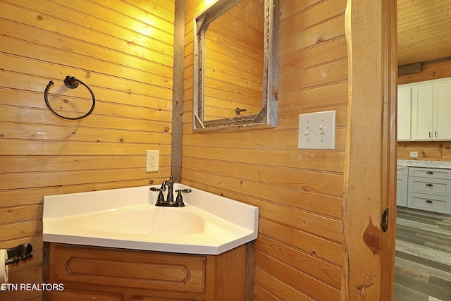 495 Bear Hollow Rd, Oneida, TN 37841 - bathroom featuring vanity and wood walls