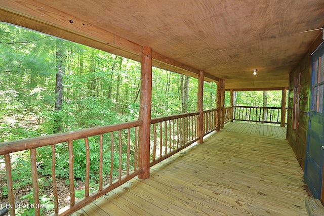 495 Bear Hollow Rd, Oneida, TN 37841 - wooden terrace featuring a view of trees