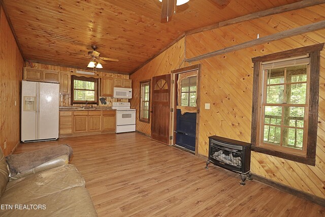 495 Bear Hollow Rd, Oneida, TN 37841 - kitchen with white appliances, a ceiling fan, wooden walls, a sink, and lofted ceiling