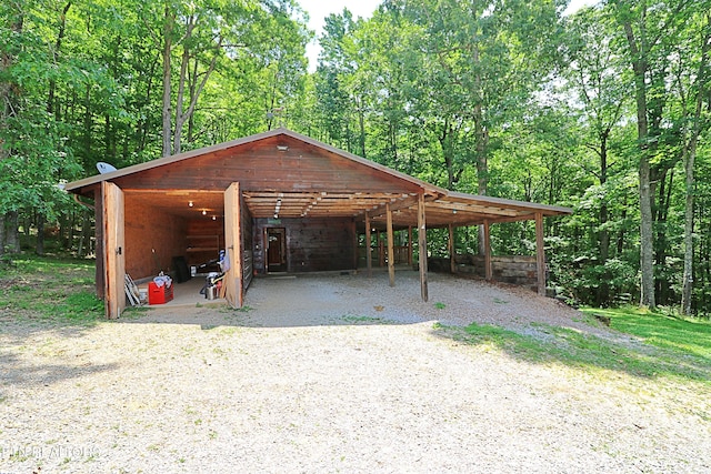 495 Bear Hollow Rd, Oneida, TN 37841 - view of parking featuring a detached carport