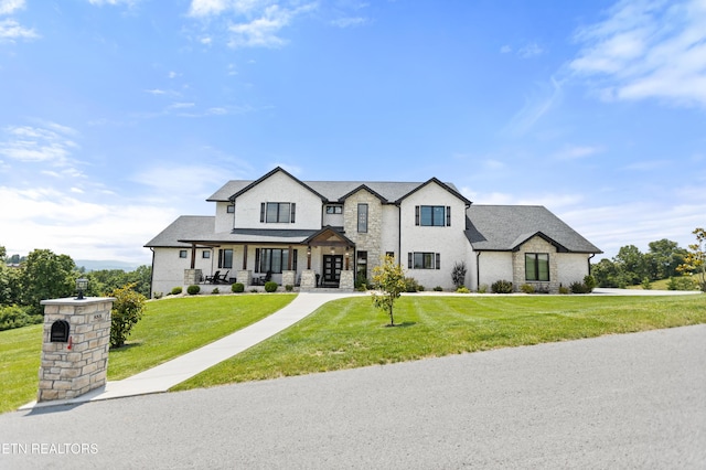 888 Smokey Quartz Blvd, New Tazewell, TN 37825 - view of front of property featuring a front yard, stone siding, and a shingled roof