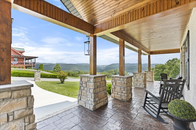 888 Smokey Quartz Blvd, New Tazewell, TN 37825 - covered porch featuring a mountain view