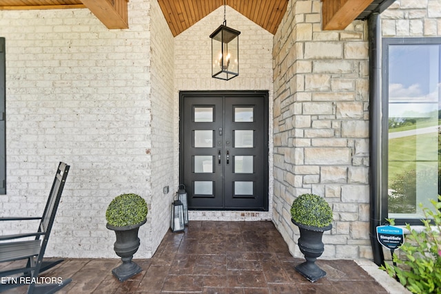 888 Smokey Quartz Blvd, New Tazewell, TN 37825 - view of exterior entry with french doors and brick siding