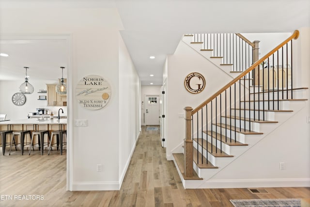 888 Smokey Quartz Blvd, New Tazewell, TN 37825 - foyer with light wood-type flooring, baseboards, stairway, and recessed lighting