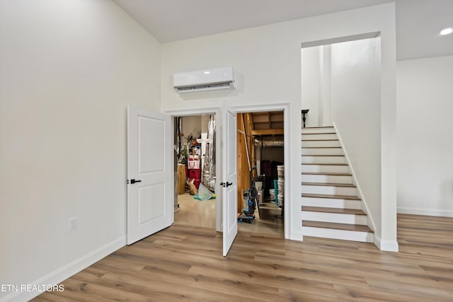888 Smokey Quartz Blvd, New Tazewell, TN 37825 - stairs with a wall mounted AC, wood finished floors, baseboards, and recessed lighting