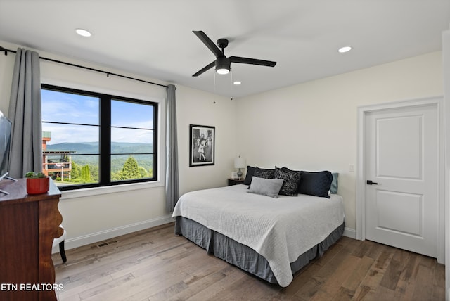 888 Smokey Quartz Blvd, New Tazewell, TN 37825 - bedroom featuring wood finished floors, baseboards, recessed lighting, and ceiling fan