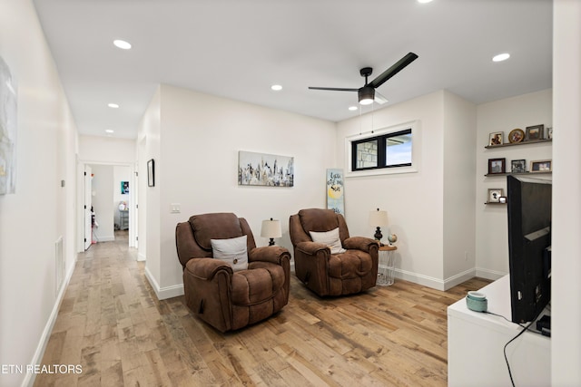 888 Smokey Quartz Blvd, New Tazewell, TN 37825 - living area featuring light wood finished floors, recessed lighting, ceiling fan, and baseboards