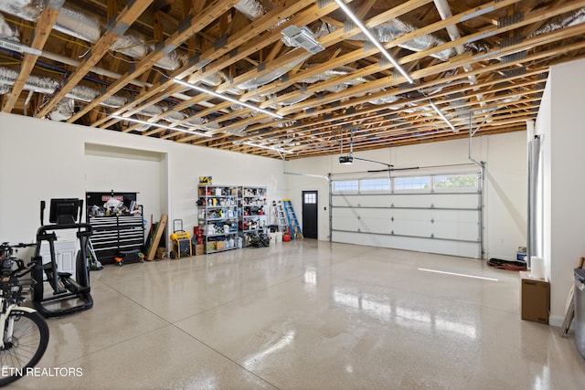 888 Smokey Quartz Blvd, New Tazewell, TN 37825 - garage featuring a garage door opener