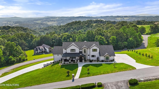 888 Smokey Quartz Blvd, New Tazewell, TN 37825 - aerial view of property and surrounding area featuring a forest and mountains