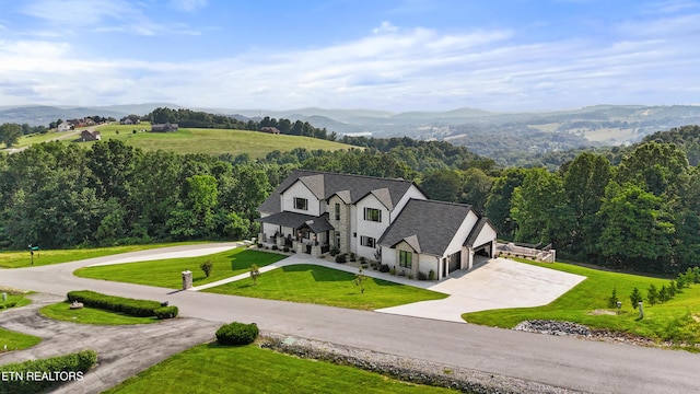 888 Smokey Quartz Blvd, New Tazewell, TN 37825 - aerial view of property and surrounding area with a mountain backdrop