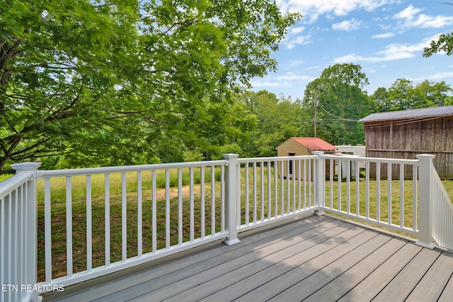 1095 Franklin Rd, Jamestown, TN 38556 - wooden deck with an outbuilding and a yard