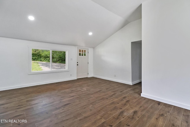 1095 Franklin Rd, Jamestown, TN 38556 - unfurnished living room with vaulted ceiling, dark wood-style flooring, baseboards, and recessed lighting