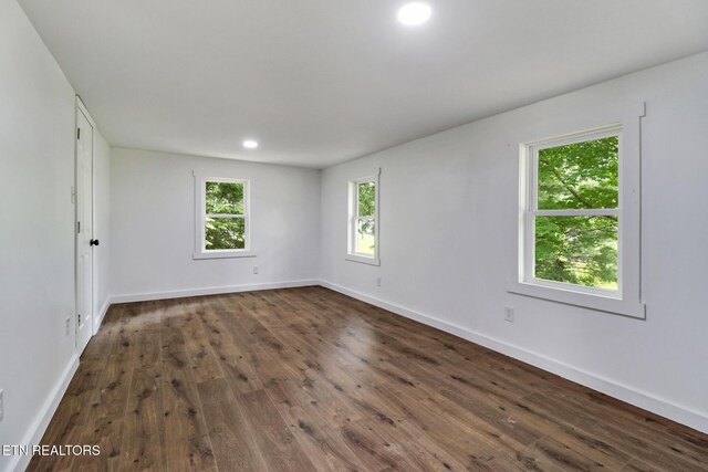 1095 Franklin Rd, Jamestown, TN 38556 - unfurnished room featuring dark wood-type flooring, baseboards, and recessed lighting