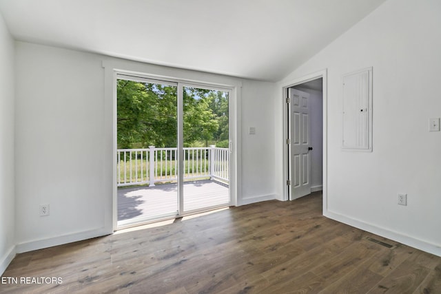 1095 Franklin Rd, Jamestown, TN 38556 - spare room featuring vaulted ceiling, wood finished floors, and baseboards