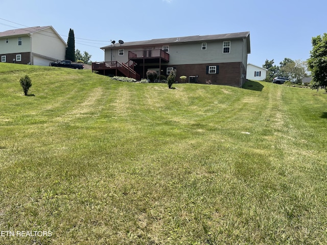 159 Emory Ln, Tazewell, TN 37879 - rear view of property with a deck, a yard, and central AC