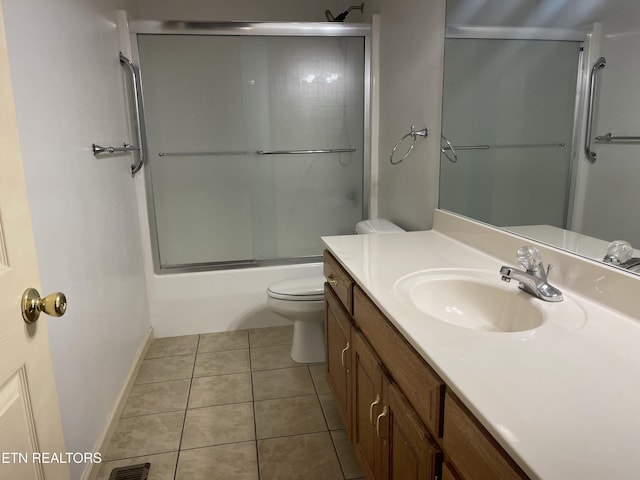 159 Emory Ln, Tazewell, TN 37879 - full bathroom with vanity, toilet, tile patterned flooring, shower / bath combination with glass door, and baseboards