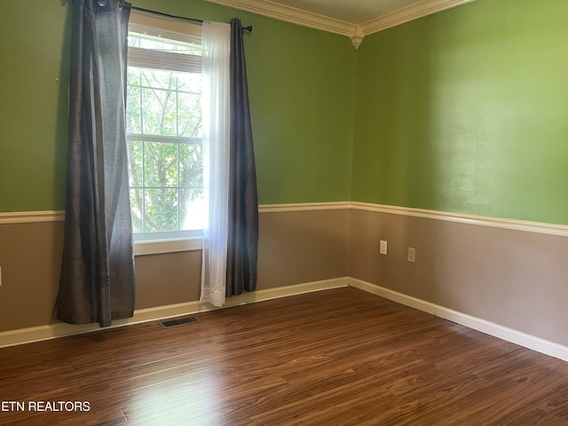 159 Emory Ln, Tazewell, TN 37879 - spare room featuring crown molding, plenty of natural light, dark wood-style floors, and baseboards