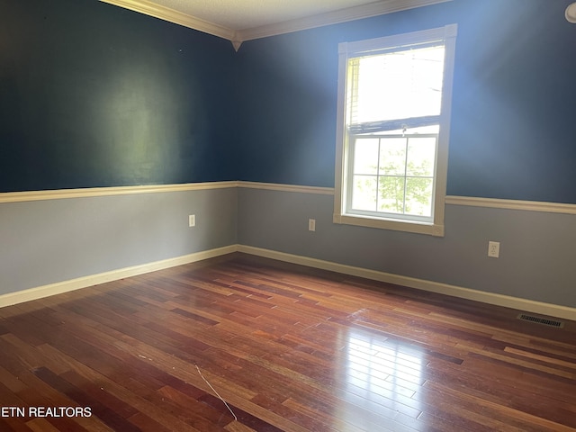 159 Emory Ln, Tazewell, TN 37879 - empty room with dark wood-style floors, crown molding, and baseboards