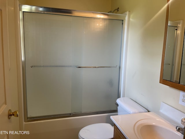 159 Emory Ln, Tazewell, TN 37879 - bathroom with toilet, vanity, and shower / bath combination with glass door