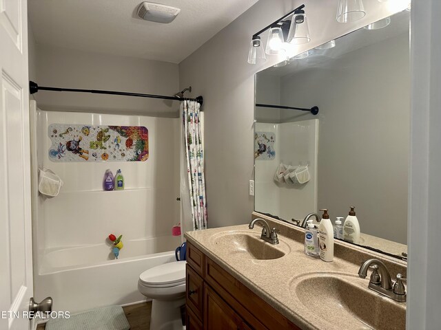 306 E Tri County Blvd, Oliver Springs, TN 37840 - full bathroom featuring shower / bath combo with shower curtain, toilet, double vanity, and wood finished floors