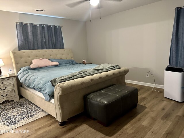 306 E Tri County Blvd, Oliver Springs, TN 37840 - bedroom with wood finished floors, baseboards, and a ceiling fan