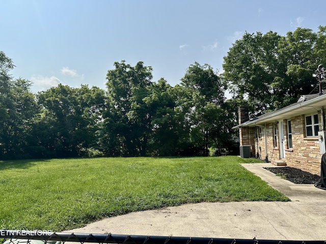306 E Tri County Blvd, Oliver Springs, TN 37840 - view of green lawn with central AC unit