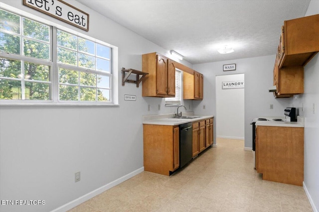 340 Mountain View Ests, Caryville, TN 37714 - kitchen with dishwasher, light countertops, brown cabinets, white range with electric stovetop, and baseboards