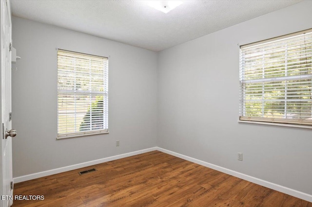 340 Mountain View Ests, Caryville, TN 37714 - unfurnished room with baseboards and wood finished floors