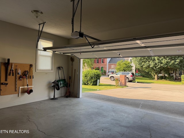 7243 Autumn View Ln, Powell, TN 37849 - garage with a garage door opener and baseboards