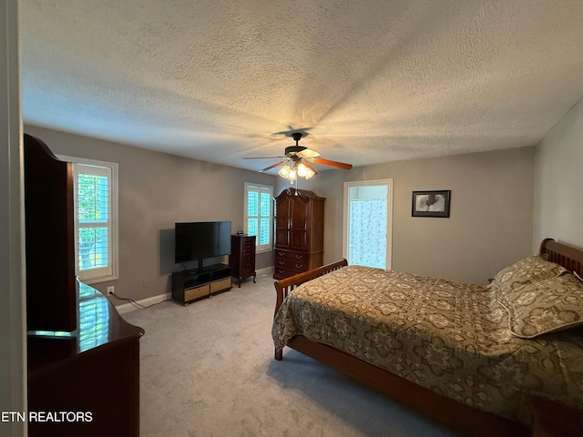 7243 Autumn View Ln, Powell, TN 37849 - bedroom featuring carpet flooring, a textured ceiling, a ceiling fan, and baseboards