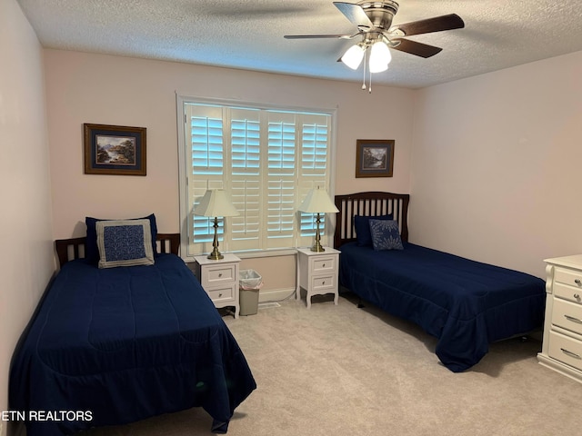 7243 Autumn View Ln, Powell, TN 37849 - carpeted bedroom featuring a textured ceiling and a ceiling fan