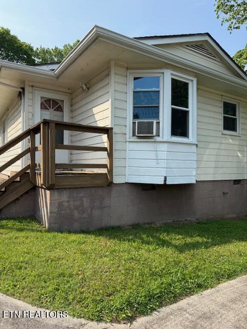 805 Sewanee St, Harriman, TN 37748 - view of property exterior featuring crawl space, a lawn, and cooling unit