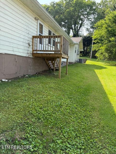 805 Sewanee St, Harriman, TN 37748 - view of grassy yard featuring stairway and a deck