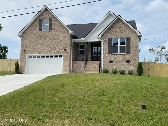 8017 Little Joe Rd, Powell, TN 37849 - view of front facade featuring an attached garage, brick siding, and driveway