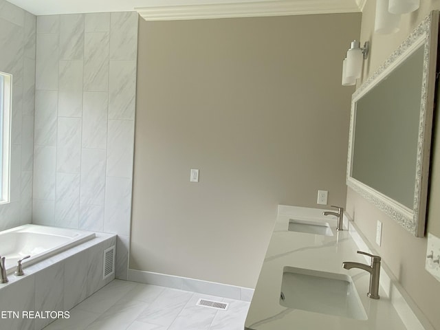 8017 Little Joe Rd, Powell, TN 37849 - bathroom featuring a bathtub, marble look tile flooring, ornamental molding, double vanity, and baseboards