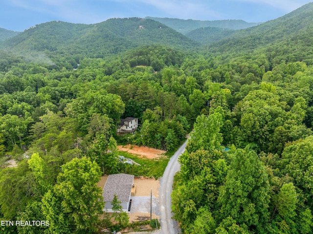 1527 Black Oak Dr, Sevierville, TN 37876 - aerial view of property and surrounding area featuring a heavily wooded area and mountains