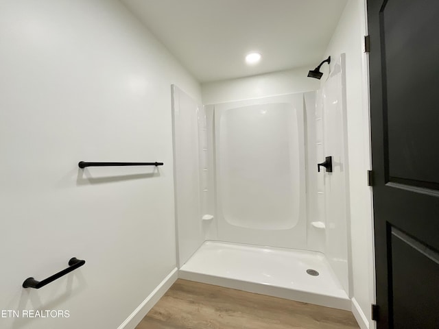 2634 Barton St, Knoxville, TN 37917 - bathroom with baseboards, wood finished floors, and a shower