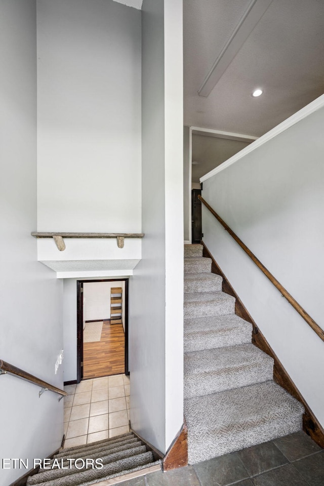 7901 Ewing Rd, Powell, TN 37849 - staircase with tile patterned floors and recessed lighting