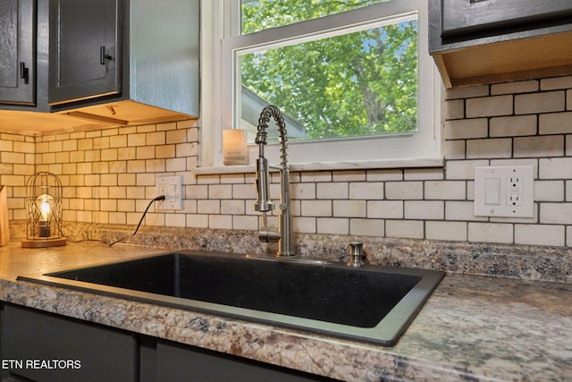 7901 Ewing Rd, Powell, TN 37849 - kitchen view of a sink and backsplash