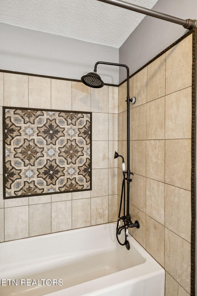 7901 Ewing Rd, Powell, TN 37849 - bathroom featuring a textured ceiling and  shower combination