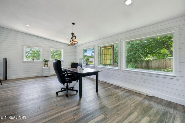 7901 Ewing Rd, Powell, TN 37849 - home office with vaulted ceiling, wood finished floors, and wooden walls