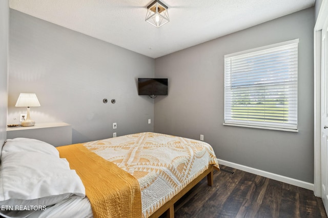 7901 Ewing Rd, Powell, TN 37849 - bedroom featuring wood finished floors and baseboards